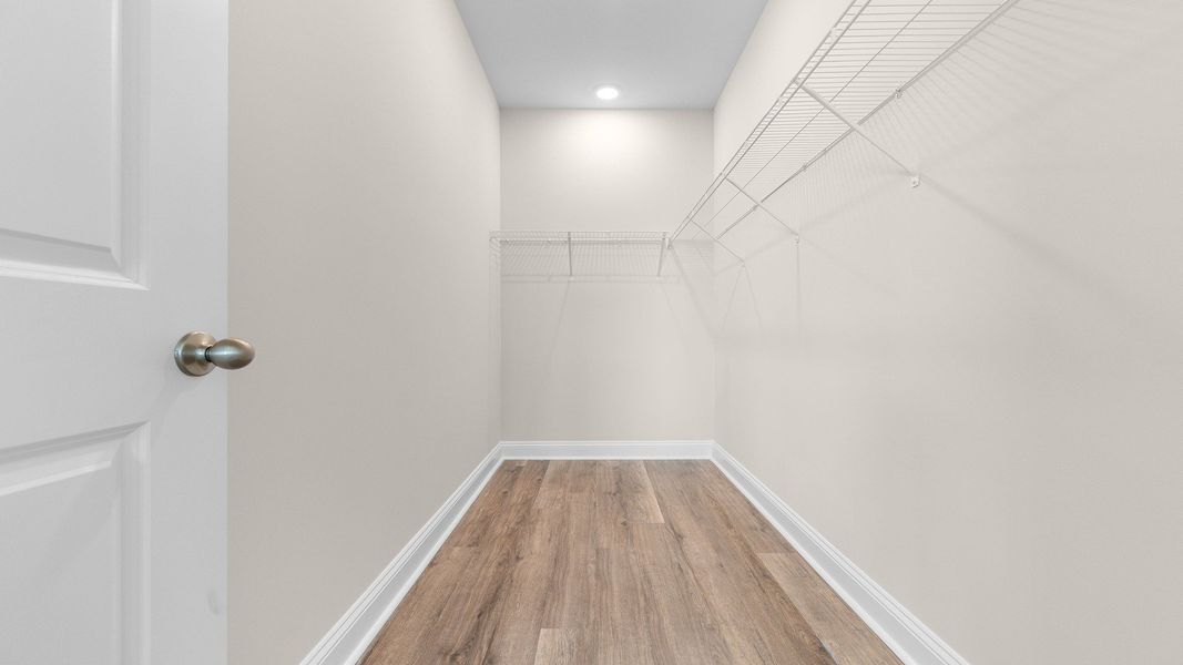 Representative unfurnished interior of a home built from the Eaton by D.R. Horton in Old Chapin Reserve, Lexington (Image 19).