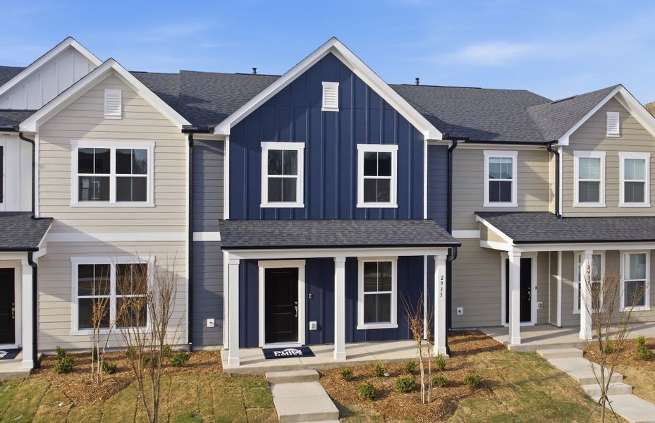 Front exterior of a new home in Saunders Farm, Willow Spring, NC, highlighting curb appeal (Image 1). Front exterior of a new home in Saunders Farm, Willow Spring, NC, highlighting curb appeal (Image 1).