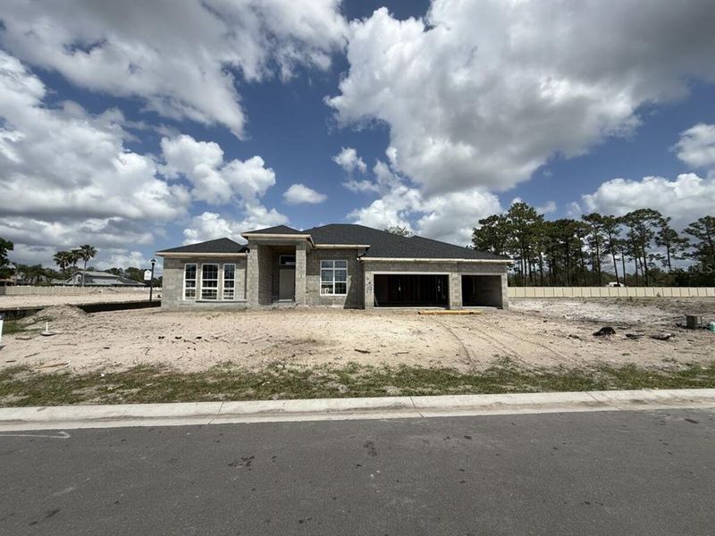 Front exterior of a new home in Hawk's Overlook, Oviedo, FL, highlighting curb appeal (Image 1). Front exterior of a new home in Hawk's Overlook, Oviedo, FL, highlighting curb appeal (Image 1).