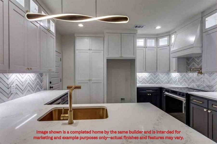 Kitchen with backsplash, light stone countertops, stainless steel range with electric cooktop, premium range hood, and recessed lighting Kitchen with backsplash, light stone countertops, stainless steel range with electric cooktop, premium range hood, and recessed lighting