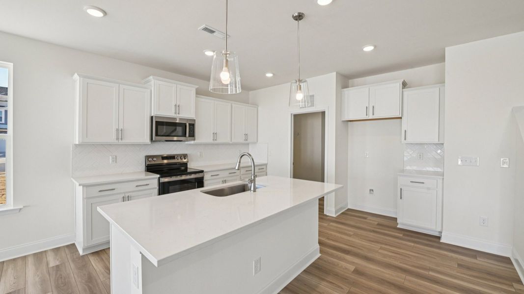 Representative furnished interior of a home built from the Chelsea by DRB Homes in Jasper Landing, Four Oaks (Image 8).