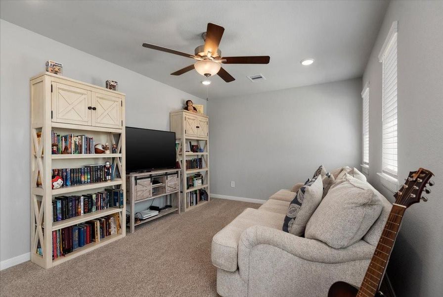 Furnished interior view inside a new home in The Grand Prairie 40’, Hockley (Image 42).