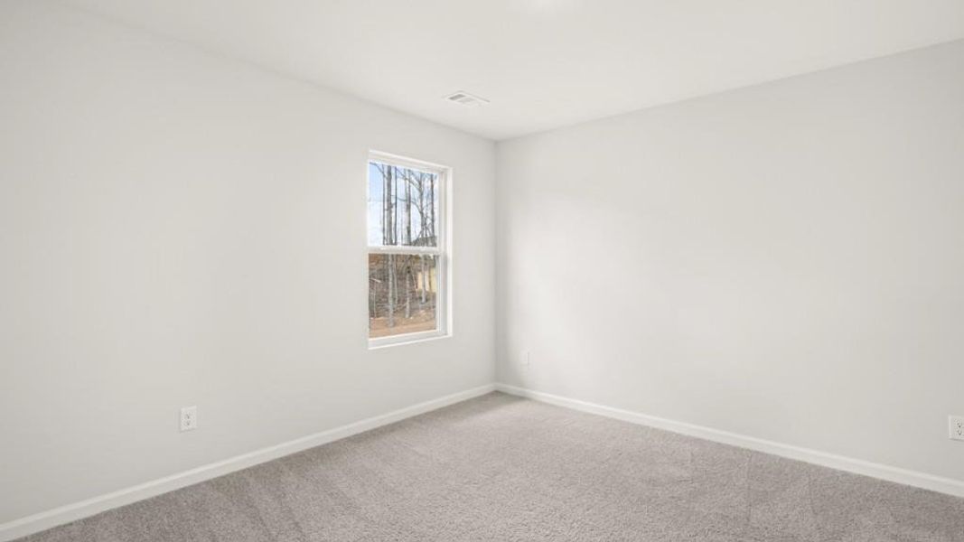 Spacious, unfurnished interior of a new home in Parkside at Carter Grove, Cartersville (Image 16).