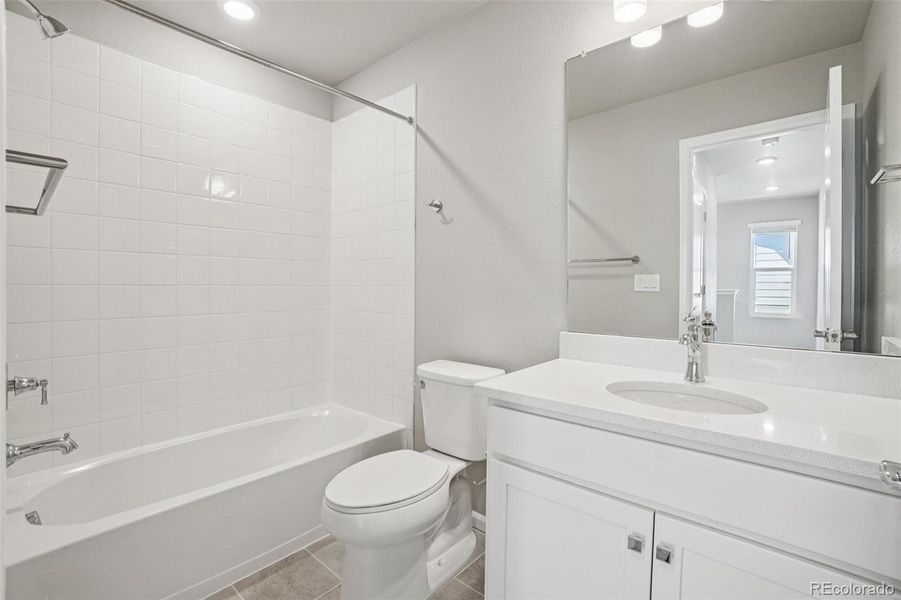 Furnished interior view inside a new home in Woodrose at Painted Prairie, Aurora (Image 11).