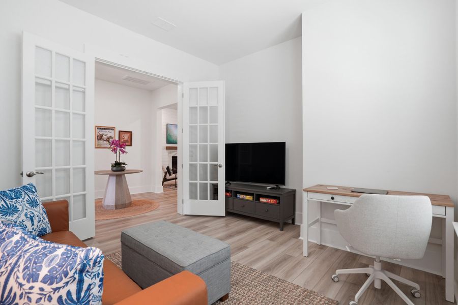 Furnished interior view inside a new home in Summerwind Crossing at Lakes of Cane Bay, Summerville (Image 9).