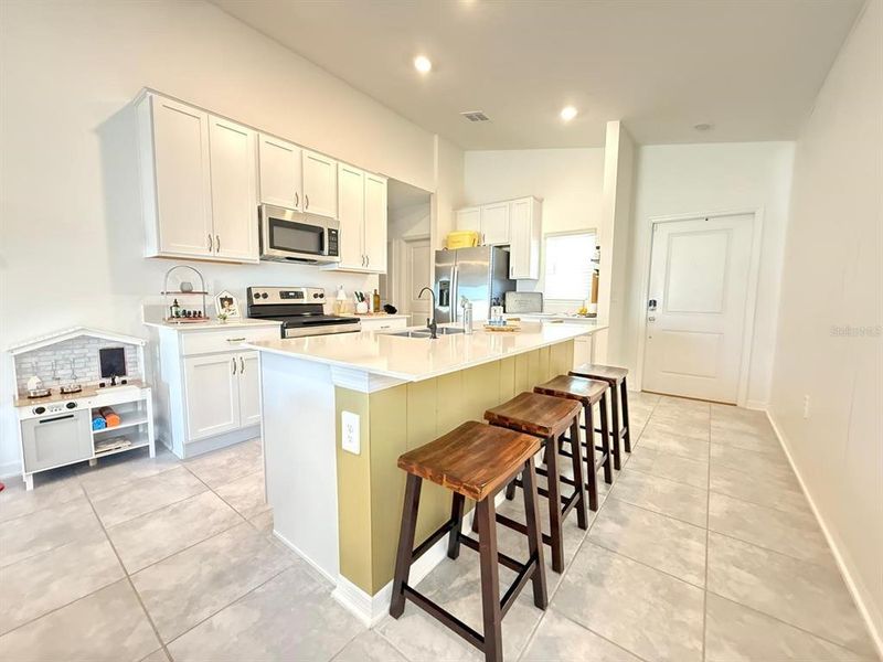 Furnished interior view inside a new home in , Kissimmee (Image 6).