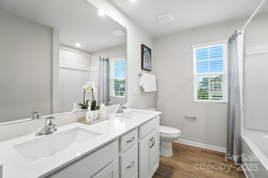 Furnished interior view inside a new home in Waxhaw Landing, Monroe (Image 24).