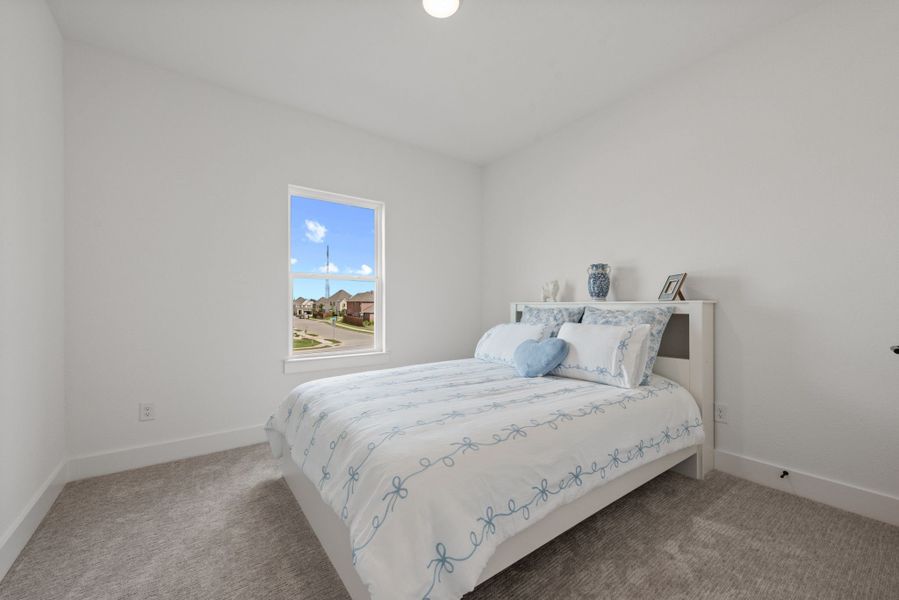 Representative furnished interior of a home built from the Plan 2 by Monarch Homes in Royal Court, Frisco (Image 32).