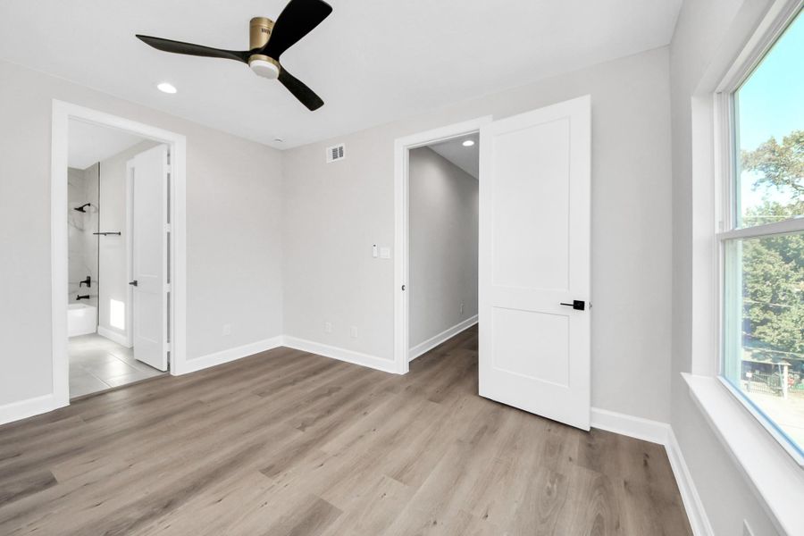 3rd floor bedroom with ensuite bathroom.