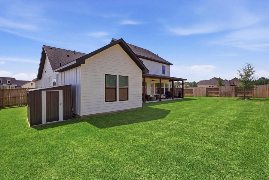 Exterior details and patio area of a home in Magnolia Woods - 70', Magnolia (Image 25).
