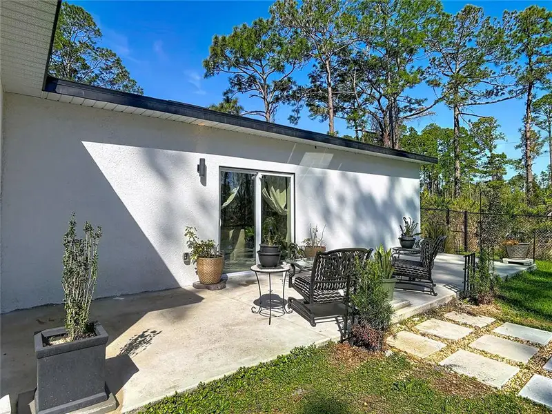 Exterior details and patio area of a home in , Deland (Image 24).