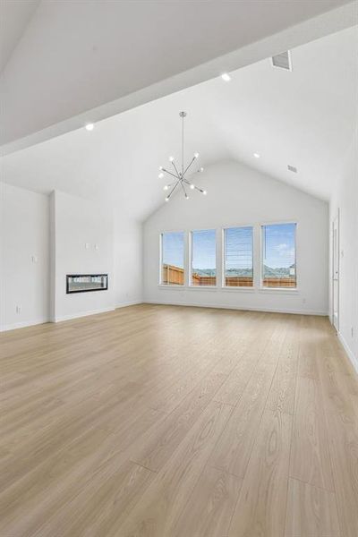 Living Room in the Claret home plan by Trophy Signature Homes – REPRESENTATIVE PHOTO