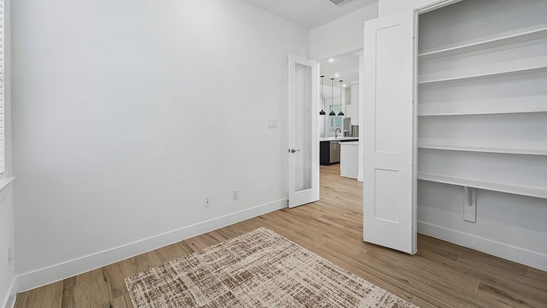 Representative unfurnished interior of a home built from the Cayman by Chesmar Homes in Crescent Bluff, Georgetown (Image 33).