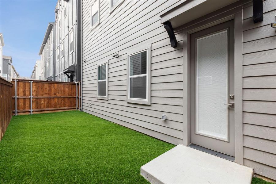 Exterior details and patio area of a home in SoHo Square, Dallas (Image 16). Exterior details and patio area of a home in SoHo Square, Dallas (Image 16).