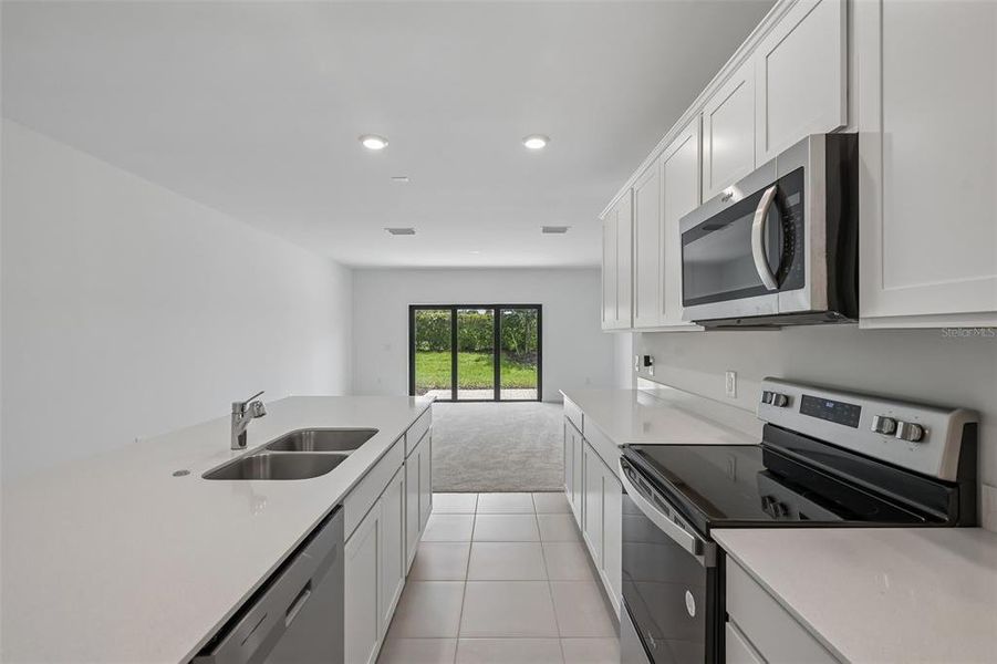 Furnished interior view inside a new home in , Sarasota (Image 8).