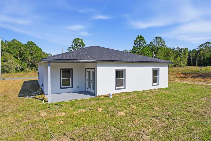 Exterior details and patio area of a home in , Citrus Springs (Image 23).