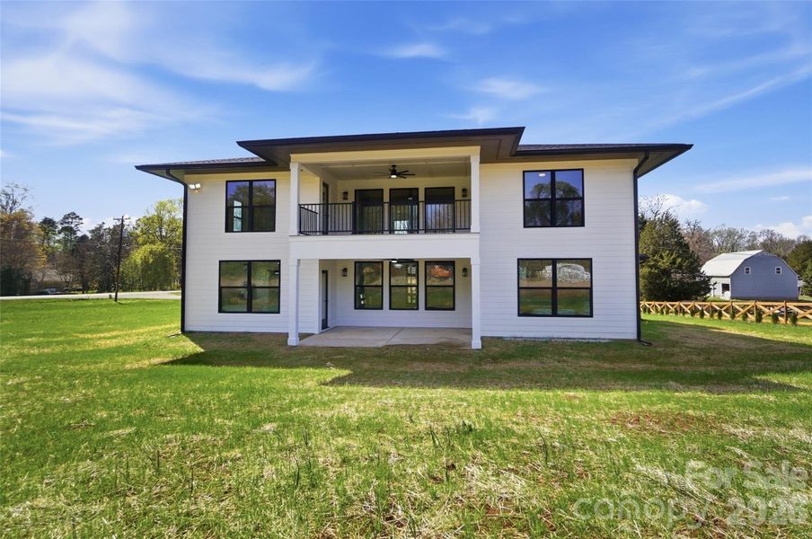 Exterior details and patio area of a home in , Mooresville (Image 25).