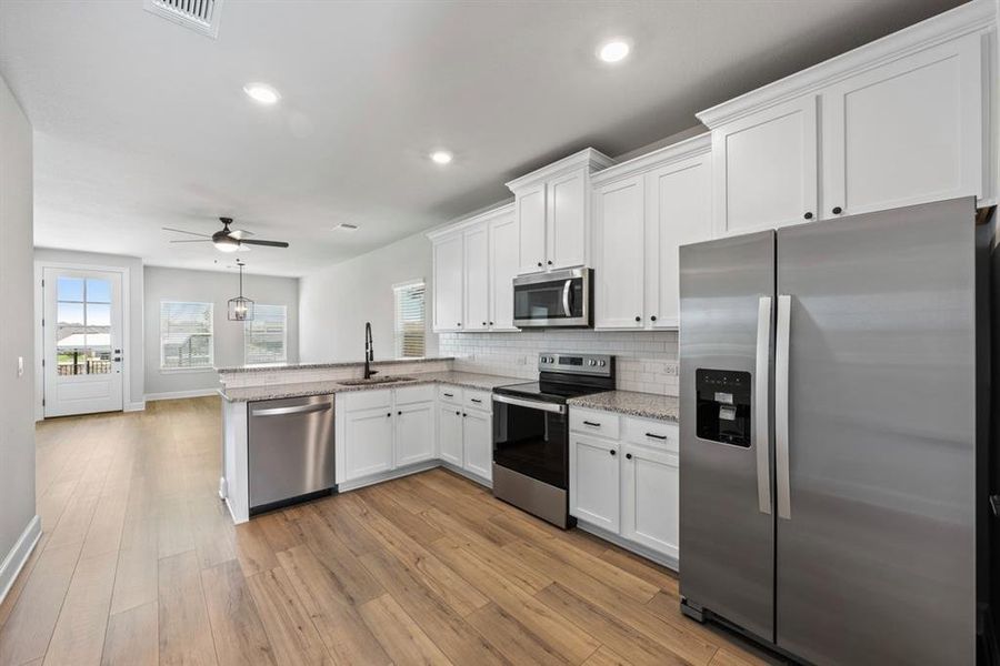 Furnished interior view inside a new home in Whisper Valley, Manor (Image 11).