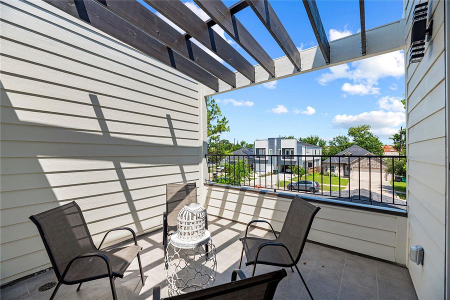 Exterior details and patio area of a home in , Houston (Image 4).