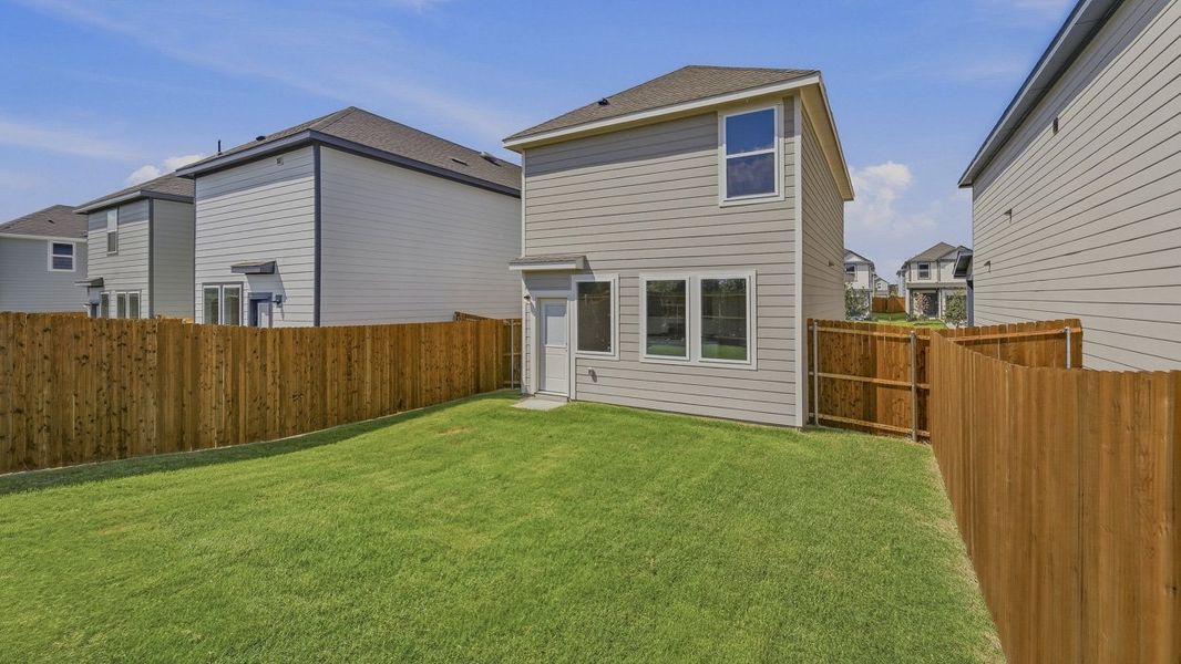 Exterior details and patio area of a home in Arbor Trails North, Princeton (Image 3).