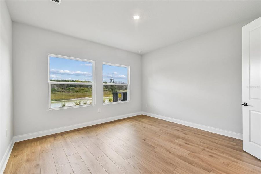 Spacious, unfurnished interior of a new home in Oakfield at Mount Dora Village Series, Mount Dora (Image 30).