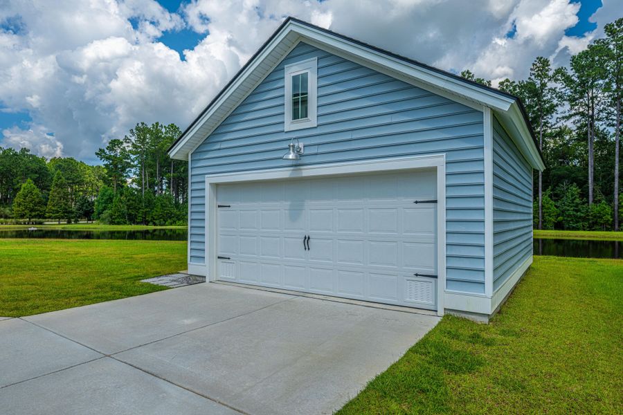 Front exterior of a new home in , Summerville, SC, highlighting curb appeal (Image 19).
