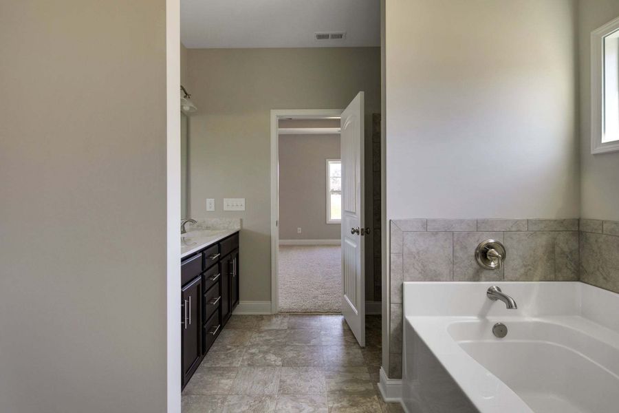 Representative furnished interior of a home built from the Bladen by Caviness & Cates Communities in Maggie Way, Wendell (Image 151).