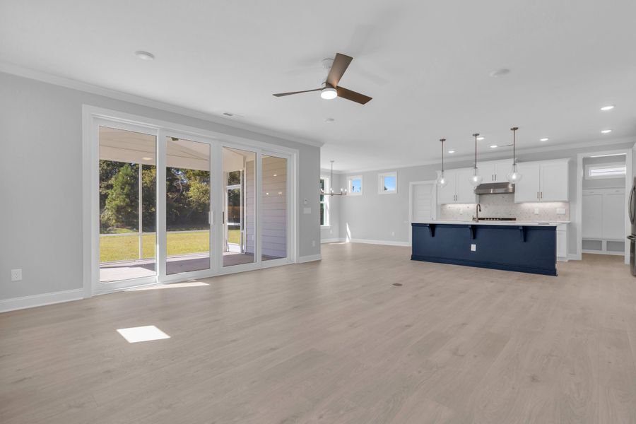 Representative furnished interior of a home built from the The Hampton by RobuckHomes in Windwater, Hampstead (Image 47).
