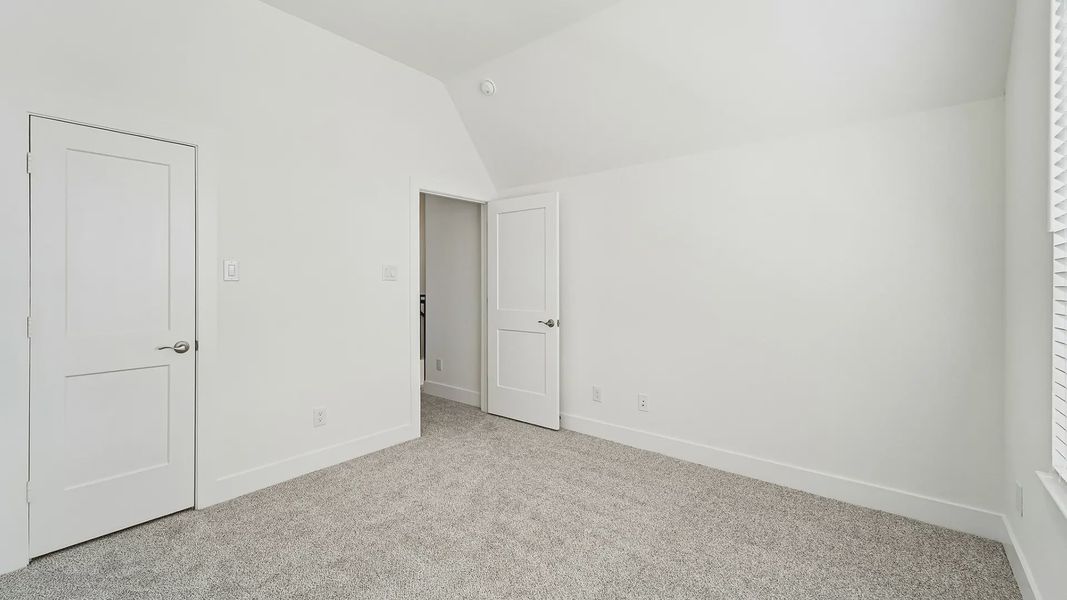 Representative unfurnished interior of a home built from the Cayman by Chesmar Homes in Crescent Bluff, Georgetown (Image 43).