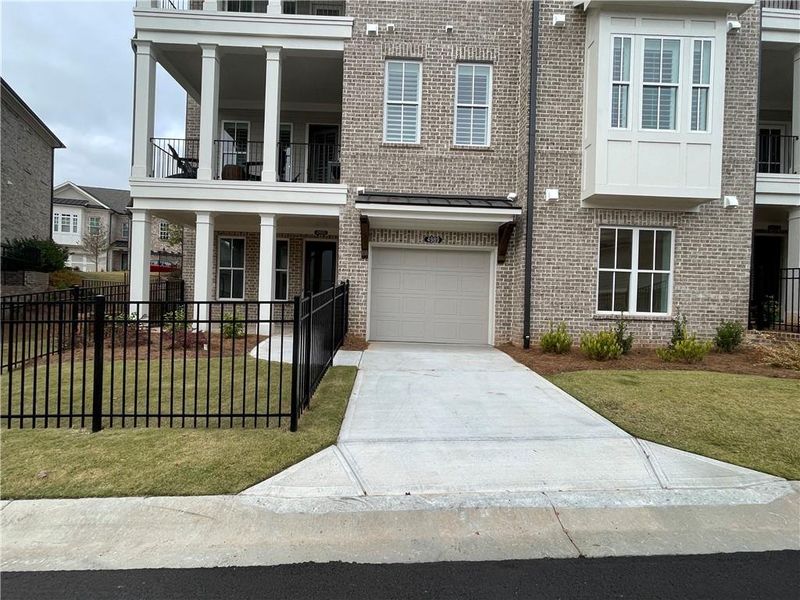 Front exterior of a new home in Waterside Condos, Peachtree Corners, GA, highlighting curb appeal (Image 22).