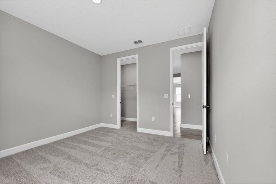 Spacious, unfurnished interior of a new home in Headwaters at Lofton Creek, Yulee (Image 29).