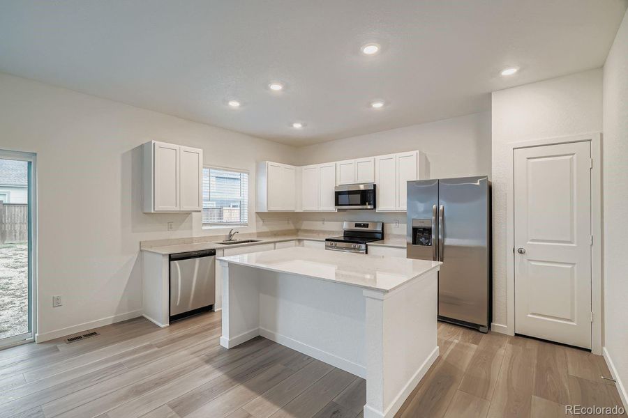 Furnished interior view inside a new home in Eastcreek Farm: The Camden Collection, Thornton (Image 5).