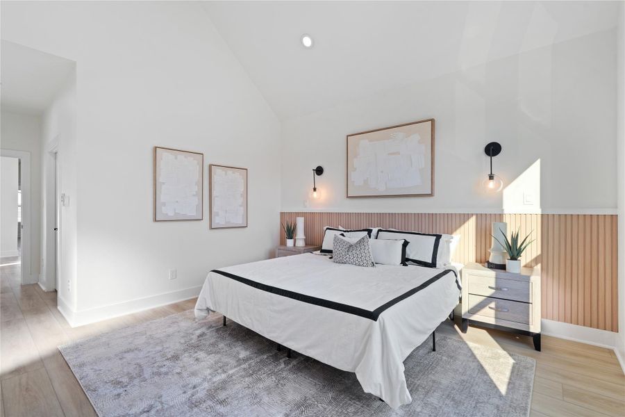 Elegant sconce lighting with warm tones adds a cozy, inviting glow to the space, perfect for accentuating design details or serving as a reading light. These thoughtful fixtures blend style and functionality, enhancing the home’s modern farmhouse charm. They create a warm, comforting ambiance that makes every room feel welcoming and lived-in.