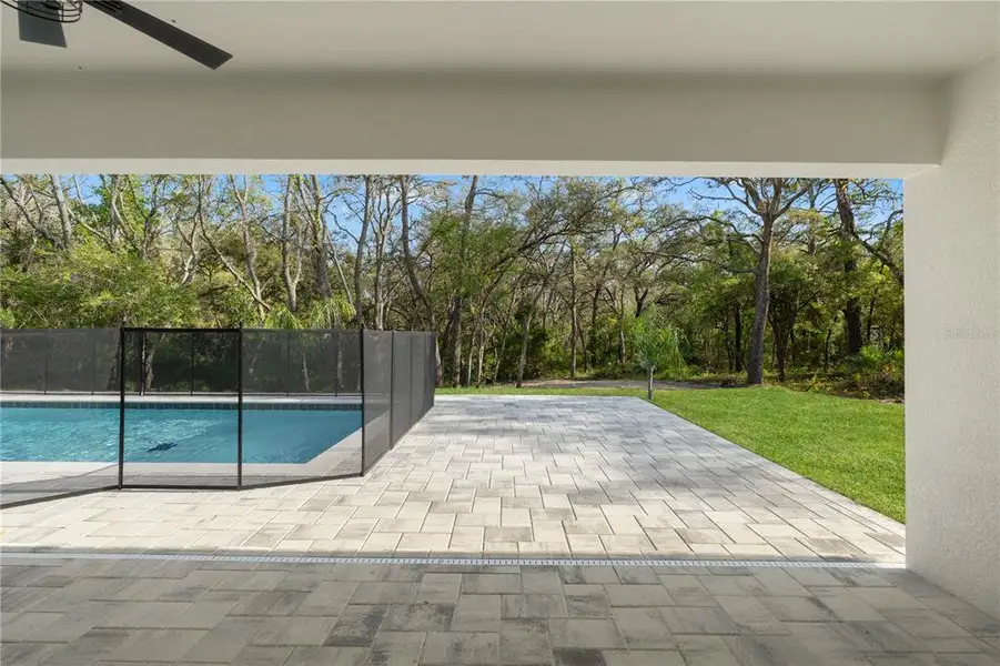 Exterior details and patio area of a home in , Weeki Wachee (Image 23).