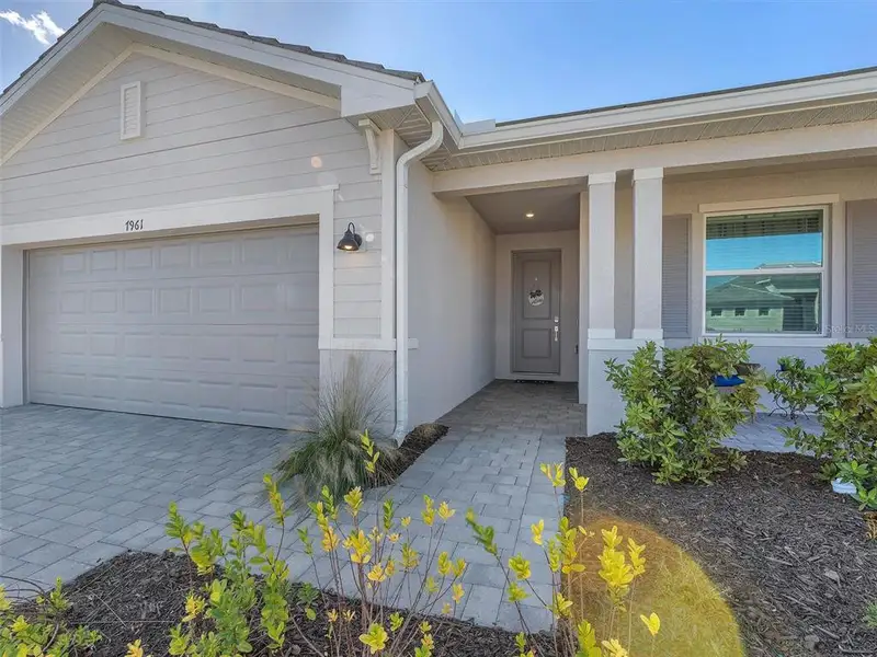 Exterior details and patio area of a home in , Port Charlotte (Image 3).