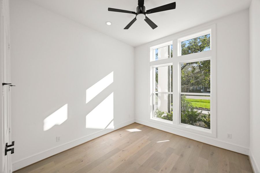 The downstairs guest room can easily fit a king-size bed!