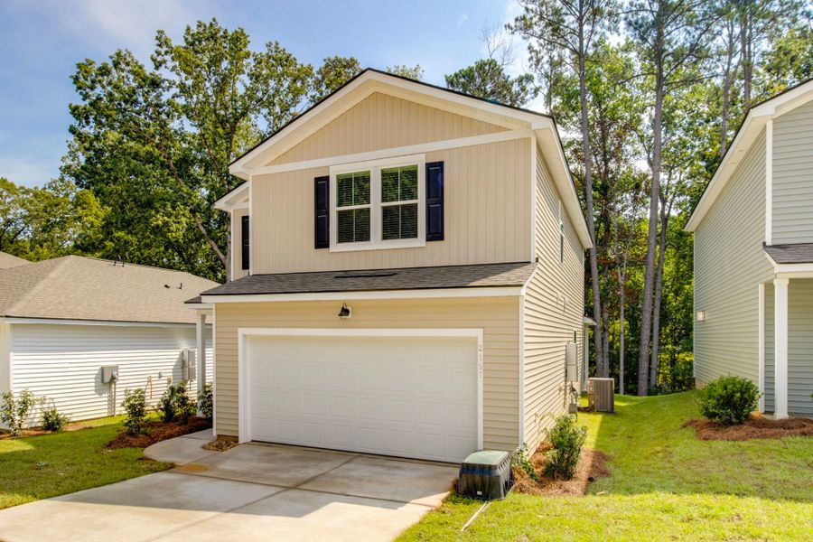 Front exterior of a new home in Grand Arbor, Blythewood, SC, highlighting curb appeal (Image 26).