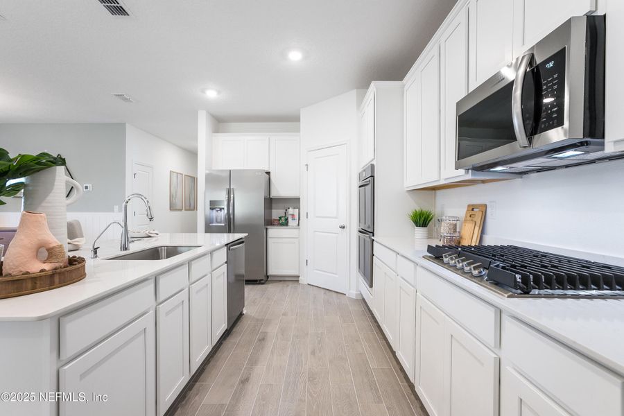 Furnished interior view inside a new home in Granary Park: Granary Park 50s, Green Cove Springs (Image 7). Furnished interior view inside a new home in Granary Park: Granary Park 50s, Green Cove Springs (Image 7).