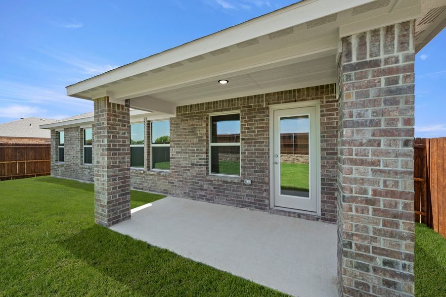 Front exterior of a new home in Baker Farms, Cleburne, TX, highlighting curb appeal (Image 27). Front exterior of a new home in Baker Farms, Cleburne, TX, highlighting curb appeal (Image 27).