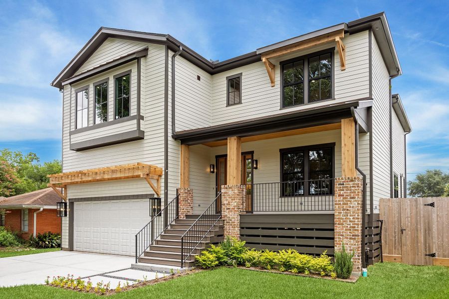 Front exterior of a new home in , Houston, TX, highlighting curb appeal (Image 1). Front exterior of a new home in , Houston, TX, highlighting curb appeal (Image 1).