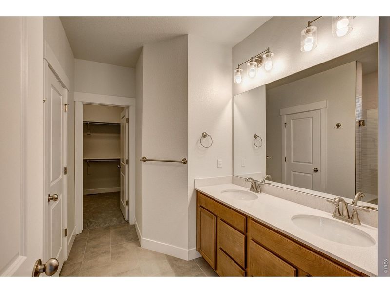 Furnished interior view inside a new home in The Lakes at Centerra - The Shores, Loveland (Image 10).