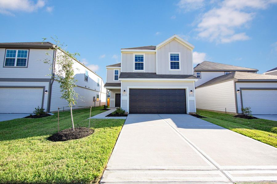 Front exterior of a new home in Wayside Village, Houston, TX, highlighting curb appeal (Image 13). Front exterior of a new home in Wayside Village, Houston, TX, highlighting curb appeal (Image 13).