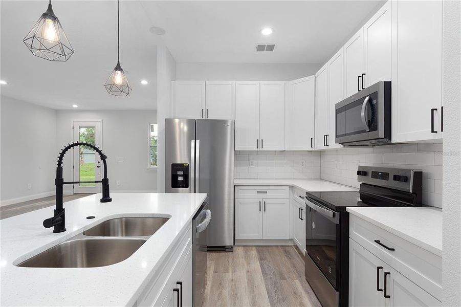 Furnished interior view inside a new home in , North Port (Image 13).