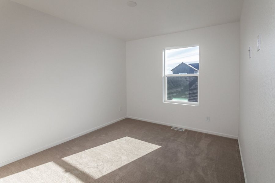 Spacious, unfurnished interior of a new home in Prairie Song, Windsor (Image 23).