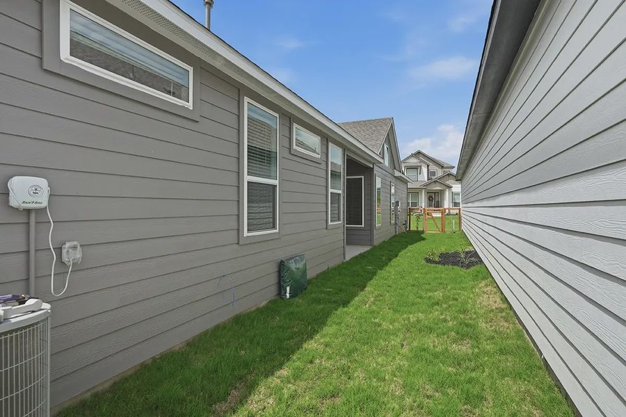 Exterior details and patio area of a home in The Crossvine, Schertz (Image 27).
