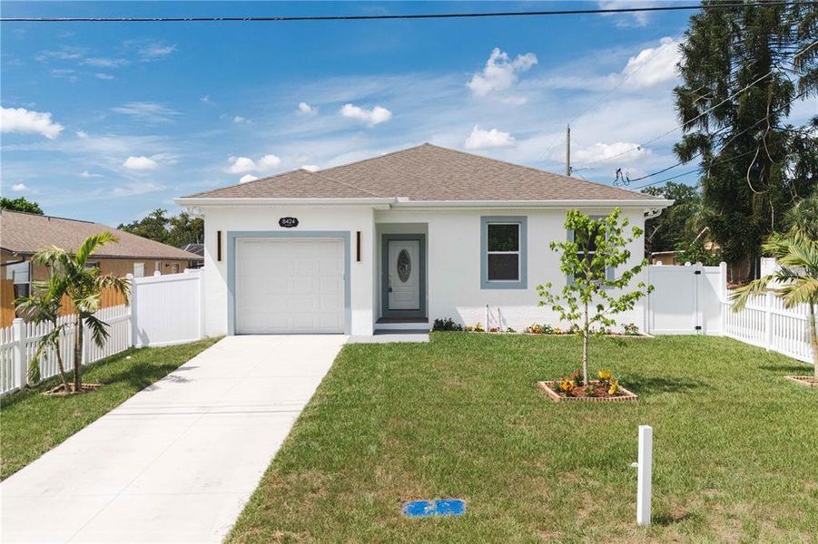 Front exterior of a new home in , Tampa, FL, highlighting curb appeal (Image 26). Front exterior of a new home in , Tampa, FL, highlighting curb appeal (Image 26).