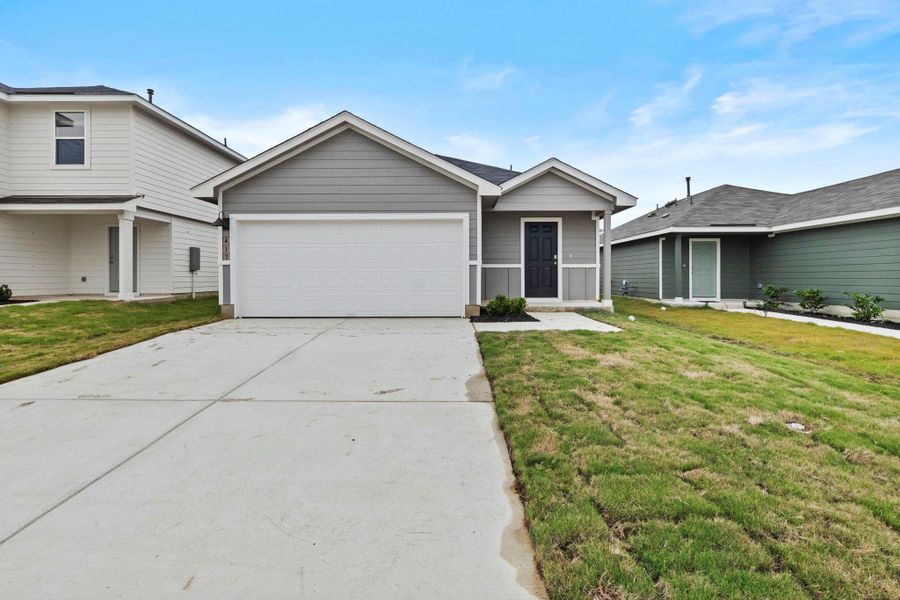 Front exterior of a new home in Sunset Oaks, Maxwell, TX, highlighting curb appeal (Image 1). Front exterior of a new home in Sunset Oaks, Maxwell, TX, highlighting curb appeal (Image 1).