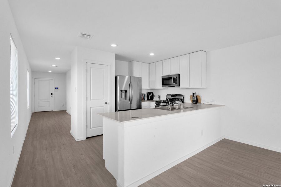 Furnished interior view inside a new home in , San Antonio (Image 5).