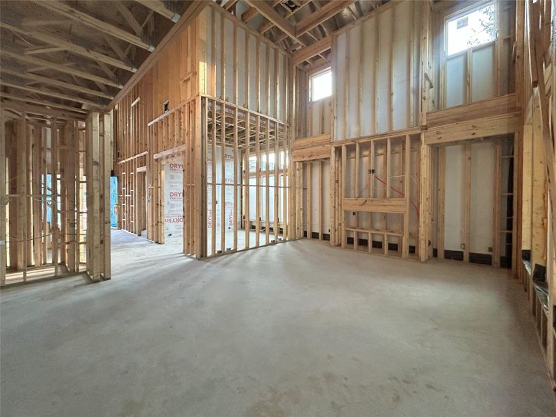 Living SPace Featuing High Ceilings and a Fireplace. Construction photo as of 9/17/2025 Living SPace Featuing High Ceilings and a Fireplace. Construction photo as of 9/17/2025