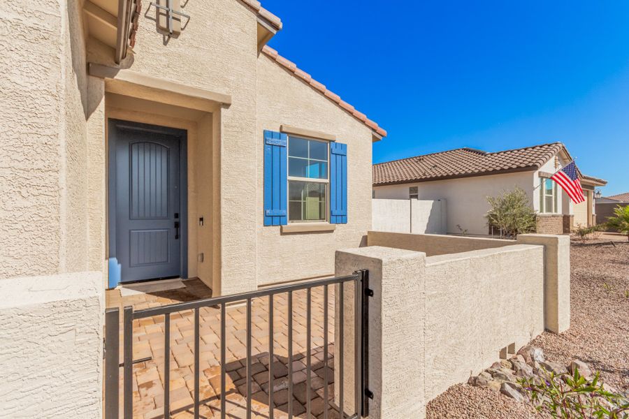 Representative exterior photo of a completed home built from the Lily by Taylor Morrison in CantaMia at Estrella 55+, Goodyear, AZ (Image 12).